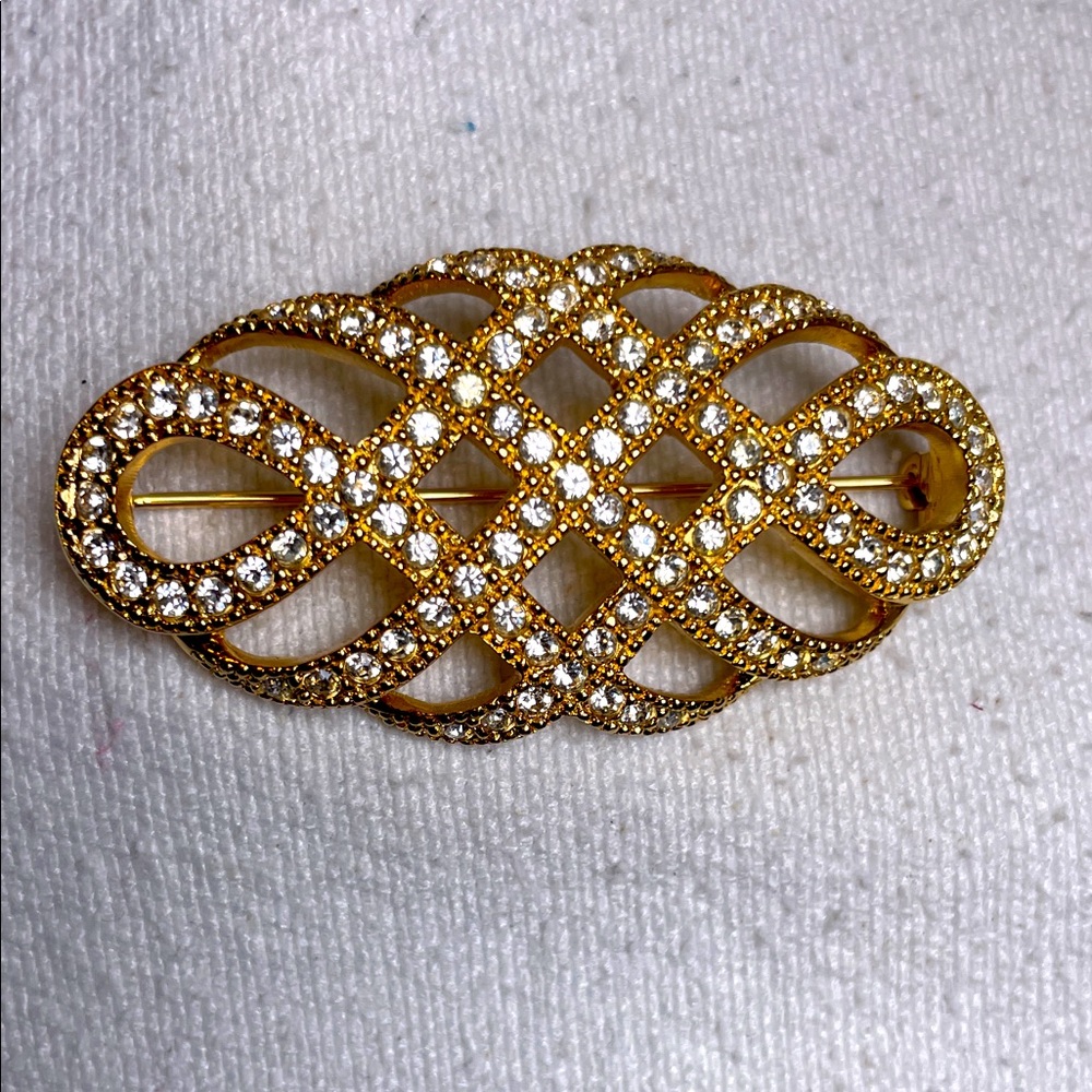 Dior gold plated woven oval Brooch with inlaid crystals
EUC includes dustbag